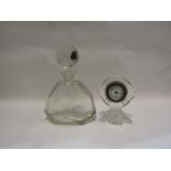 A faceted glass oversized scent bottle and timepiece