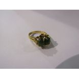 A jade two stone ring with yellow metal shank. Size O, 4.