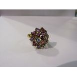 A 9ct multi-gem cluster ring.