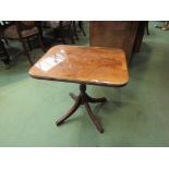 A walnut quarter veneered occasional table with glass top,