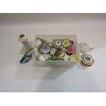 A tub of small decorative china ornaments including shoes and boots