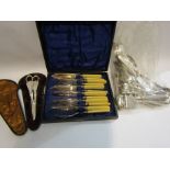 A quantity of silver plated and steel cutlery including grape scissors and sauce ladle