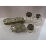 Dressing table jars with silver tops,