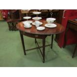 An Edwardian Pembroke table with carved border/edge, square tapering legs, filled cracks to top,