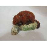 A Beswick Beaver on a log, model no.