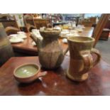 A St Ives Pottery standard ware dish and two Aylesford Pottery items, coffee pot and mug,