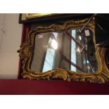 A modern gilt mirror,