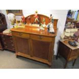 A French oak and walnut dresser base with upstand and key,