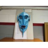 JOHN BEAVEN (XX): A painted wooden sculptural mask inspired by African masks, mounted onto panel.