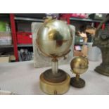 A musical desk globe and miniature