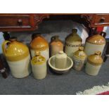 Eight stone ware jars and flagons,