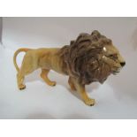 A Beswick Lion in golden brown gloss,