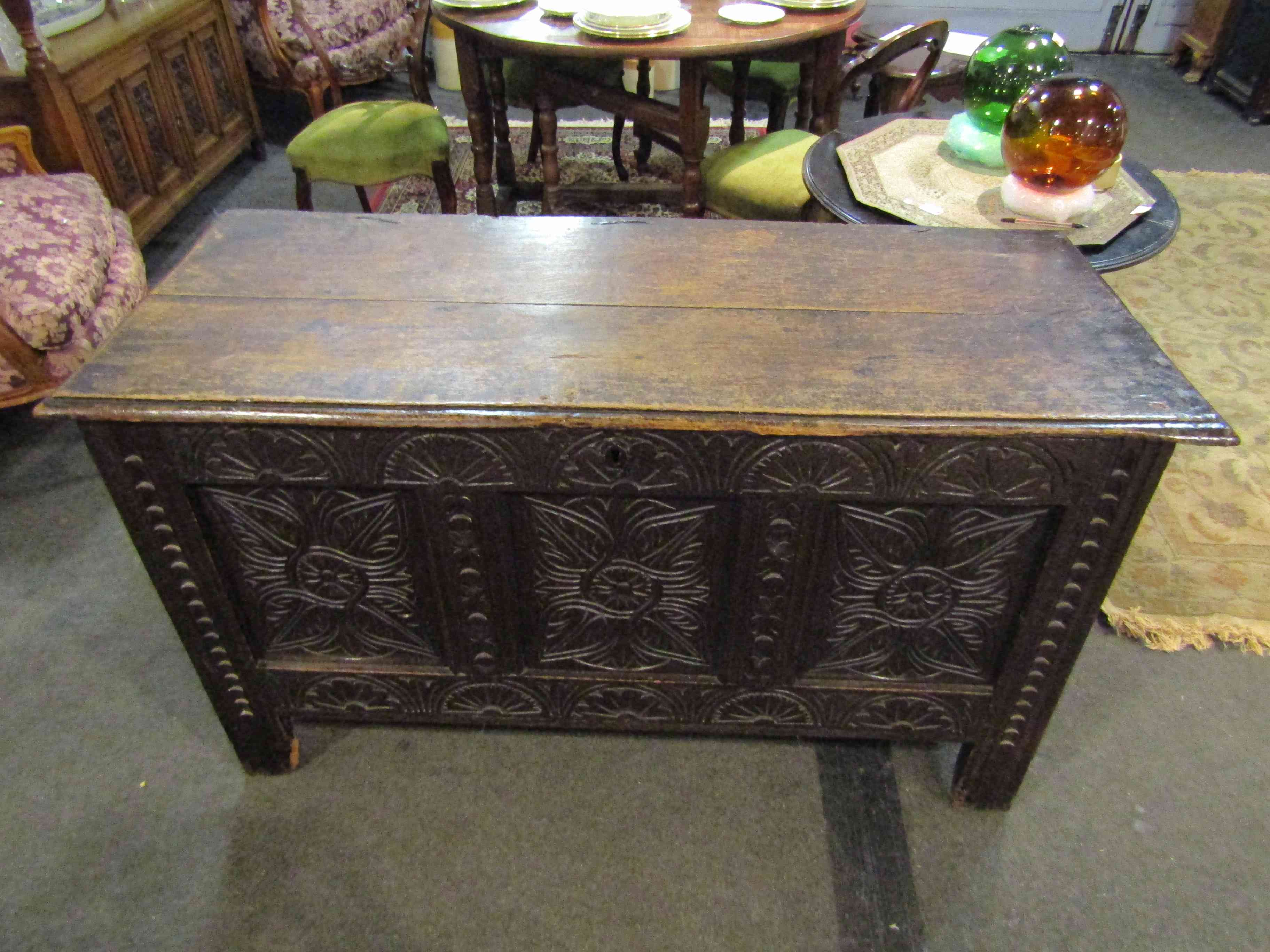 A 17th Century carved oak three panel coffer. - Image 4 of 4