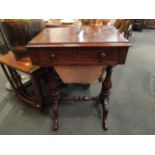 A circa 1860 burr walnut work table the single frieze drawer over a wool drawer on baluster turned