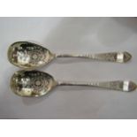 A pair of Francis Howard silver bright-cut serving spoons,