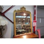 An early 19th Century gesso framed 5ft overmantel mirror with egg and dart border,