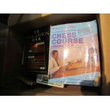 A box of chess and bridge related books