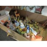 A box of Wade figurines including Betty Boop, Arthur Hare,