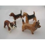 Four Beswick small dogs - Beagle "Wendover Billy", model no.1939, Cairn Terrier, model no.