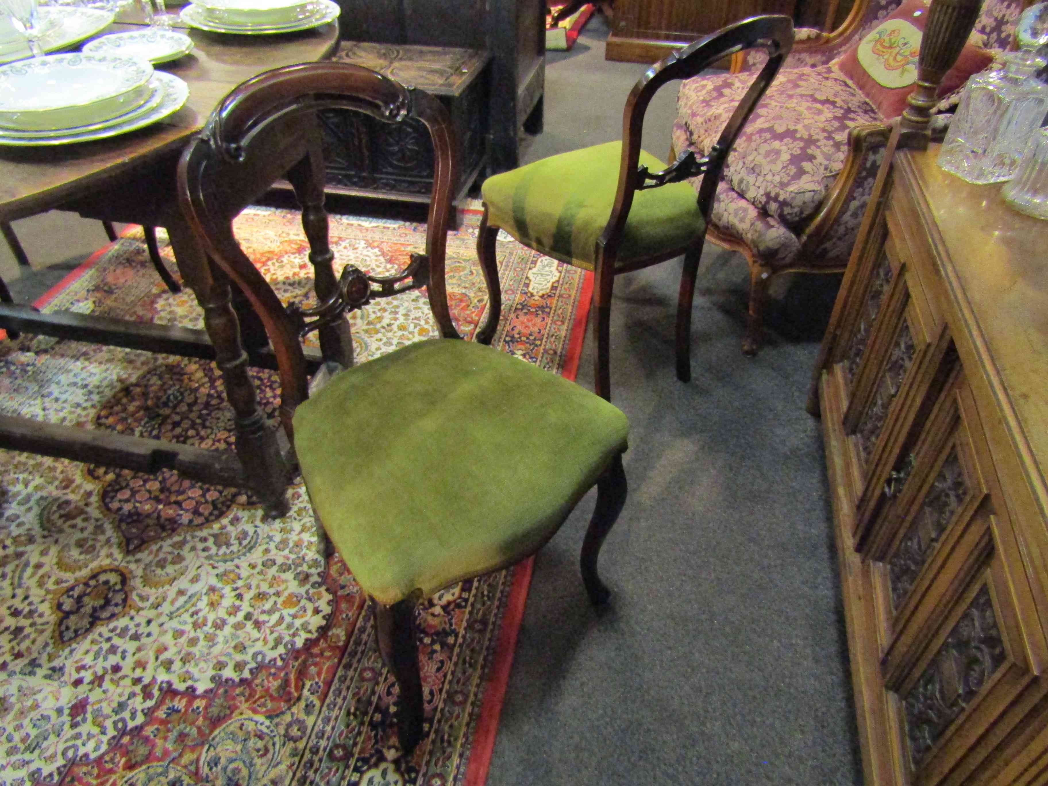 A set of four Victorian walnut balloon back dining chairs, sprung stuffed serpenetine front seats, - Image 2 of 2