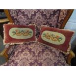 Two velvet cushions with needlepoint panels and toning fringing