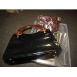 Four 1970's classic fashion handbags in iconic shapes including leather and suede,