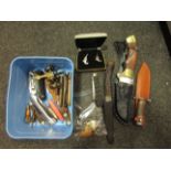 A tub of various pen knives, gun cufflinks,