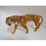 A Beswick Tigress, in tan/black stripes gloss, model no.