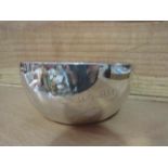 A silver christening bowl,