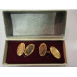 A pair of gentleman's 9ct gold oval cufflinks,