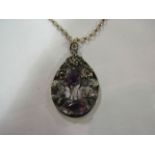 An Edwardian style necklace with pendant purple coloured stones