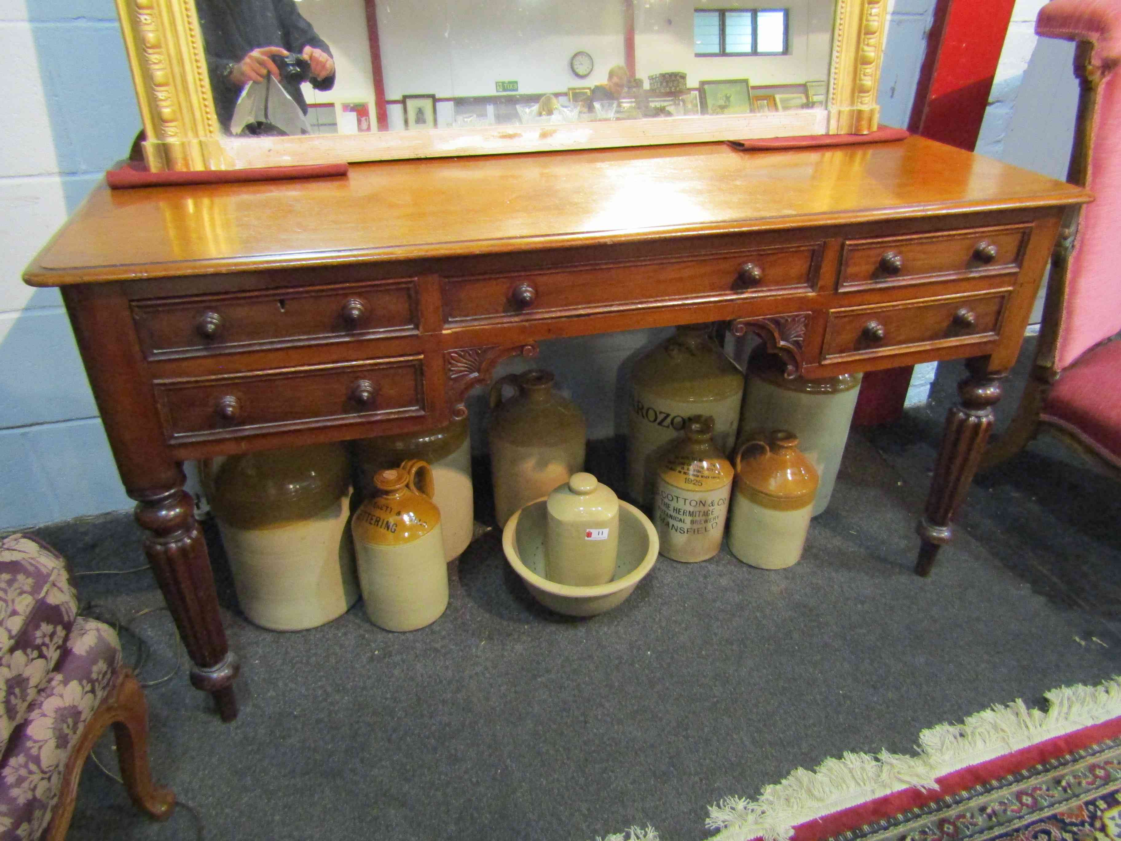 A Victorian mahogany ladies desk with five drawers,