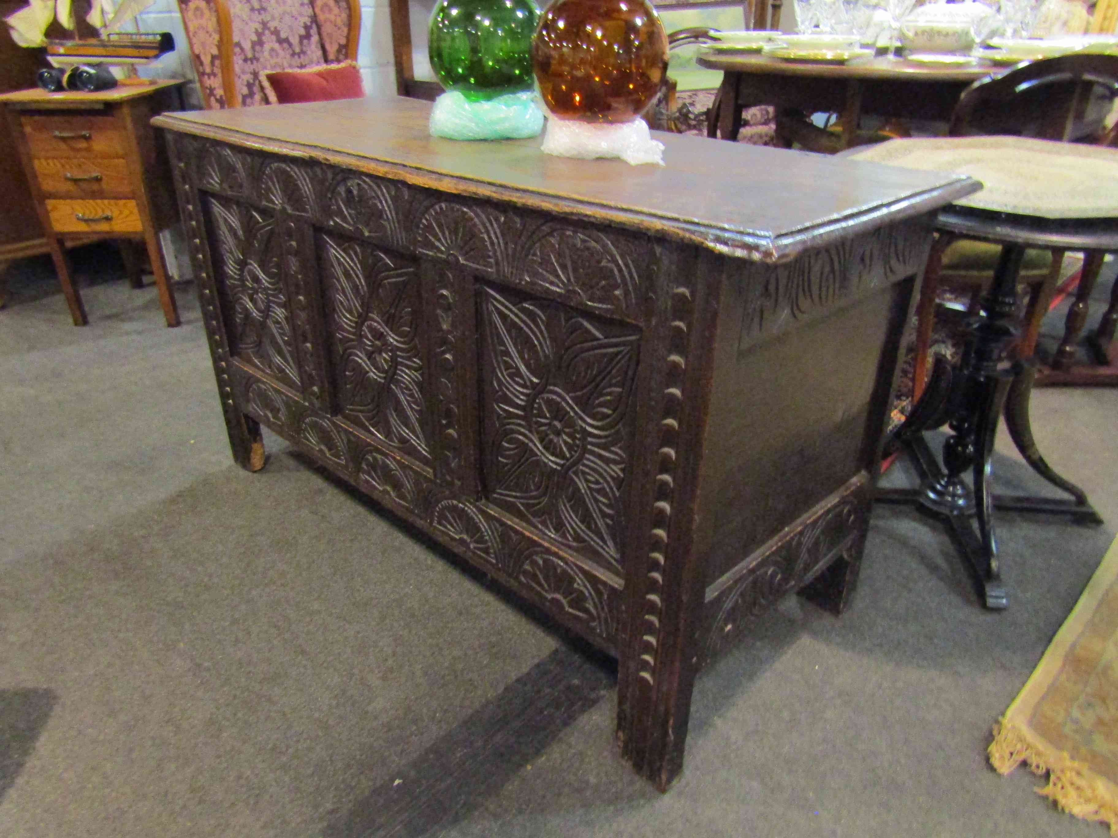 A 17th Century carved oak three panel coffer. - Image 2 of 4