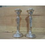 A pair of silver candlesticks