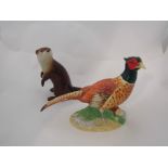 A John Beswick figure of a Pheasant together with a John Beswick figure of an Otter