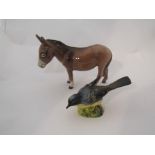 A Beswick Donkey in gloss, model no. 1364B and a Beswick Grey Wagtail in gloss, model no.