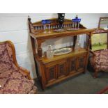 A Victorian wanlut two tier serving table/buffet with raised gallery back,