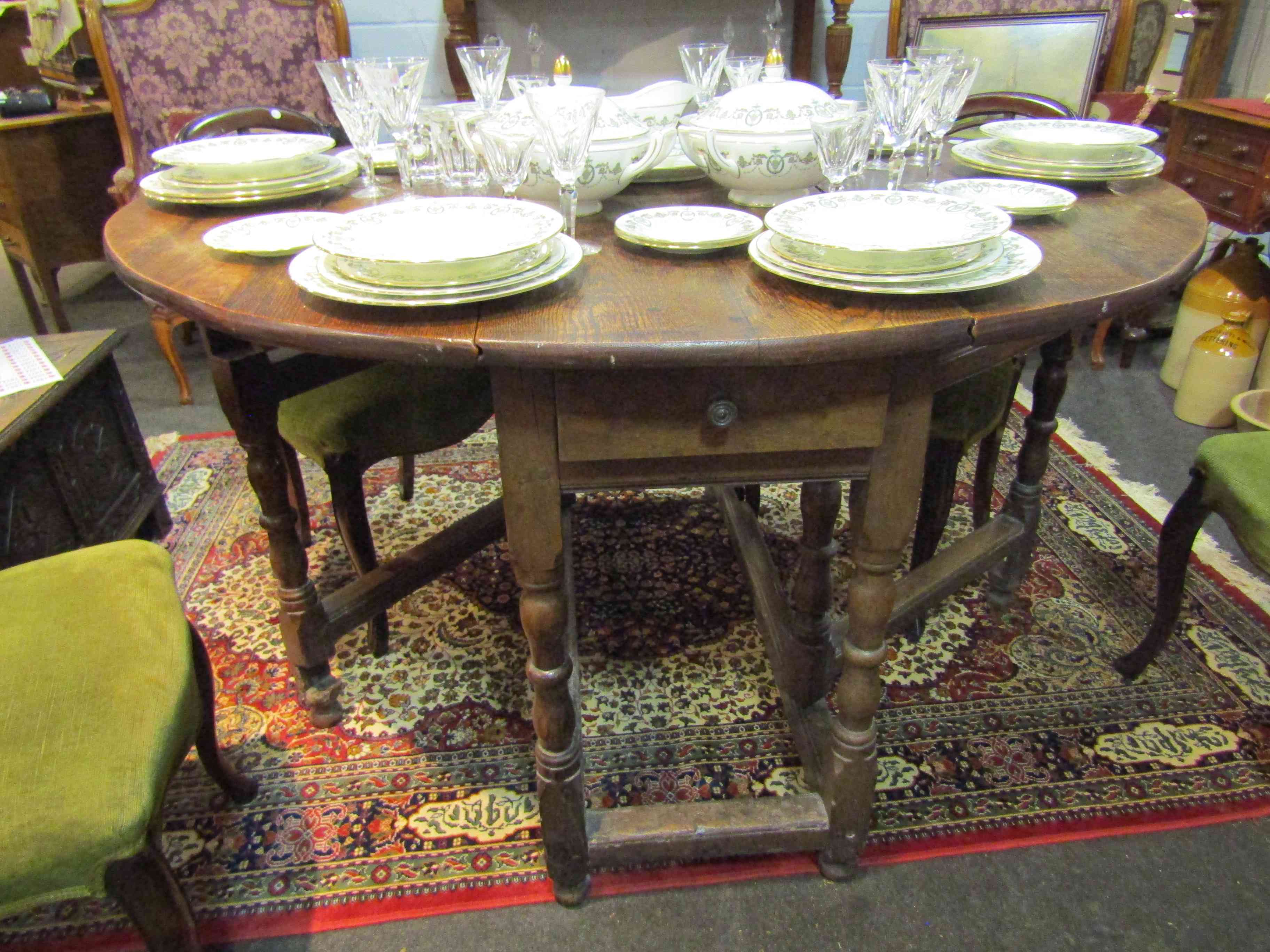 An 18th Century and later oak gateleg table