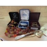 A selection of assorted items including glass bead necklaces, Aynsley pheasant brooch,