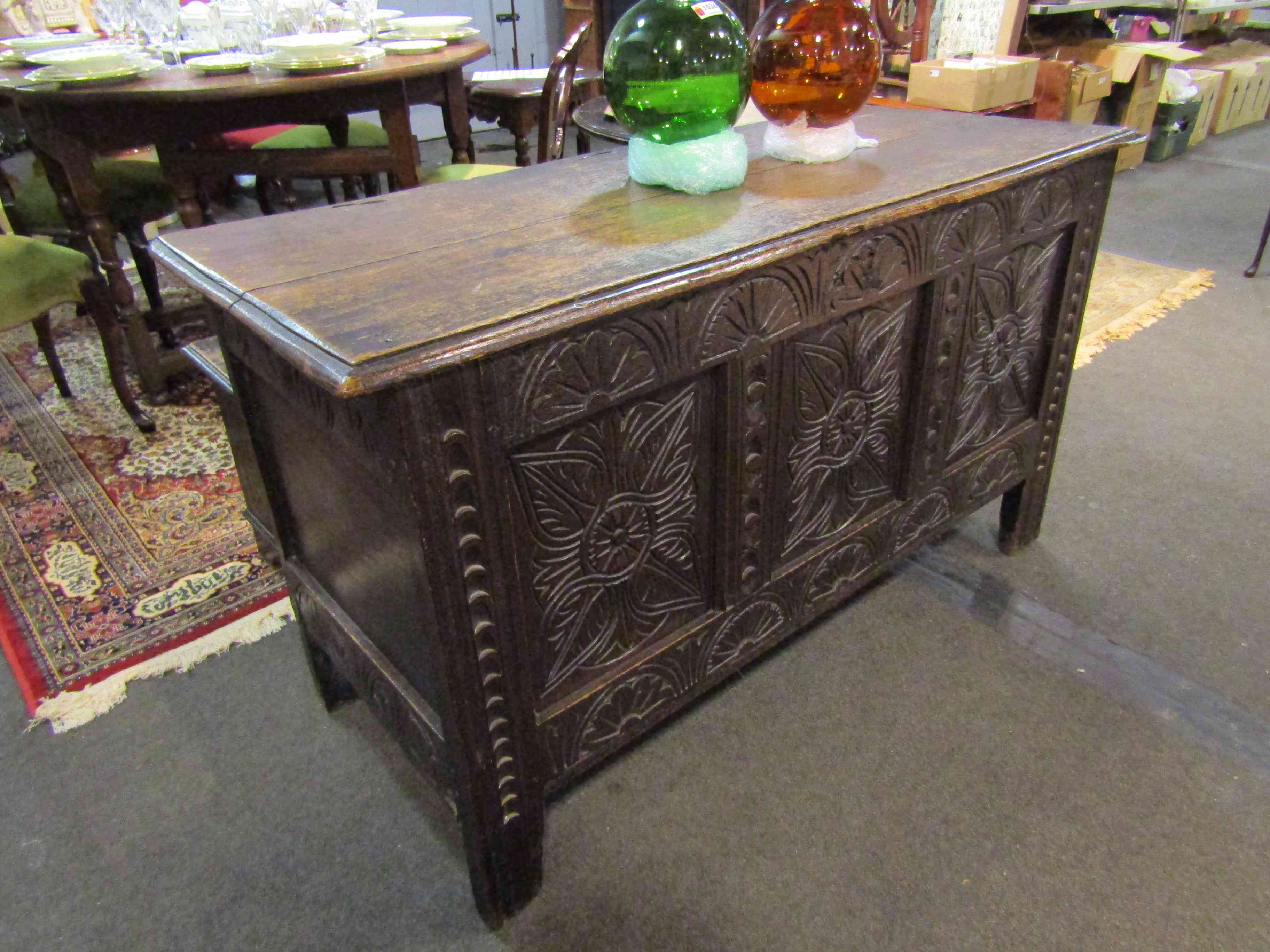 A 17th Century carved oak three panel coffer.