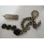 A silver charm bracelet with onyx and coin charms,