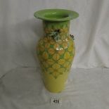 A Sally Tuffin tall vase with yellow flower pattern and applied bees, 5 of 25, (one bee wing a/f).