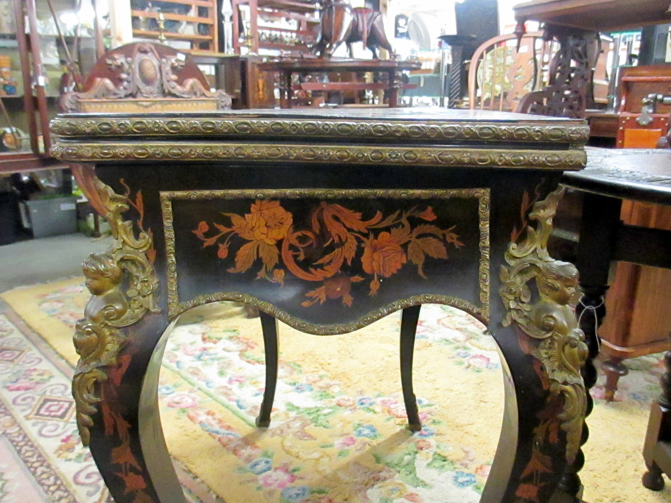 A Victorian marquetry inlaid card table. - Image 8 of 18