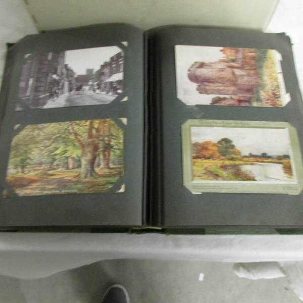 An album of vintage postcards and a box of late 20th century postcards, cigarette cards etc. - Image 4 of 5