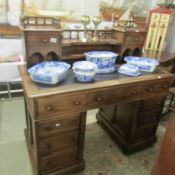 A mahogany desk with gallery back.