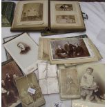 A Victorian photograph album and loose photographs.
