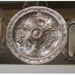 An Elkington style silver platter on copper tray.