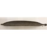 An early authentic tribal 'Woomerah' of carved leaf shape with bound gum handle.