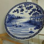 A large Chinese blue and white charger with 4 character mark.