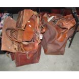 A quantity of vintage holdalls, etc., including leather.